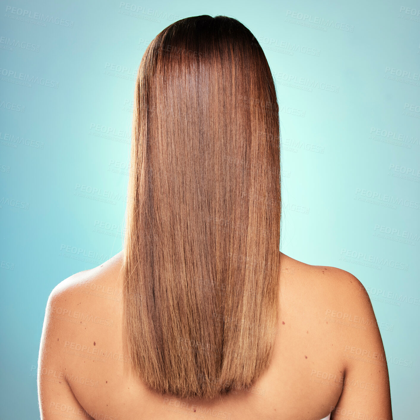 Buy stock photo Shine, back and woman with straight hair, wellness or pride for cosmetics, results and keratin treatment. Relax, girl or model in studio on blue background for healthy glow, natural growth and beauty