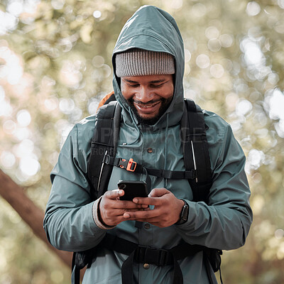 Buy stock photo Black man, phone and smile for hiking communication, social media or chat in nature outdoors. Happy African male person or hiker smiling on mobile smartphone for trekking, travel or online location