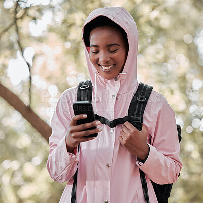 Buy stock photo Black woman, phone and smile for hiking communication, social media or chatting in nature. Happy African female person or hiker smiling on mobile smartphone for trekking, travel or online location