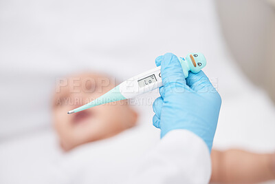 Buy stock photo Shot of a unrecognizable doctor taking a babys temperature