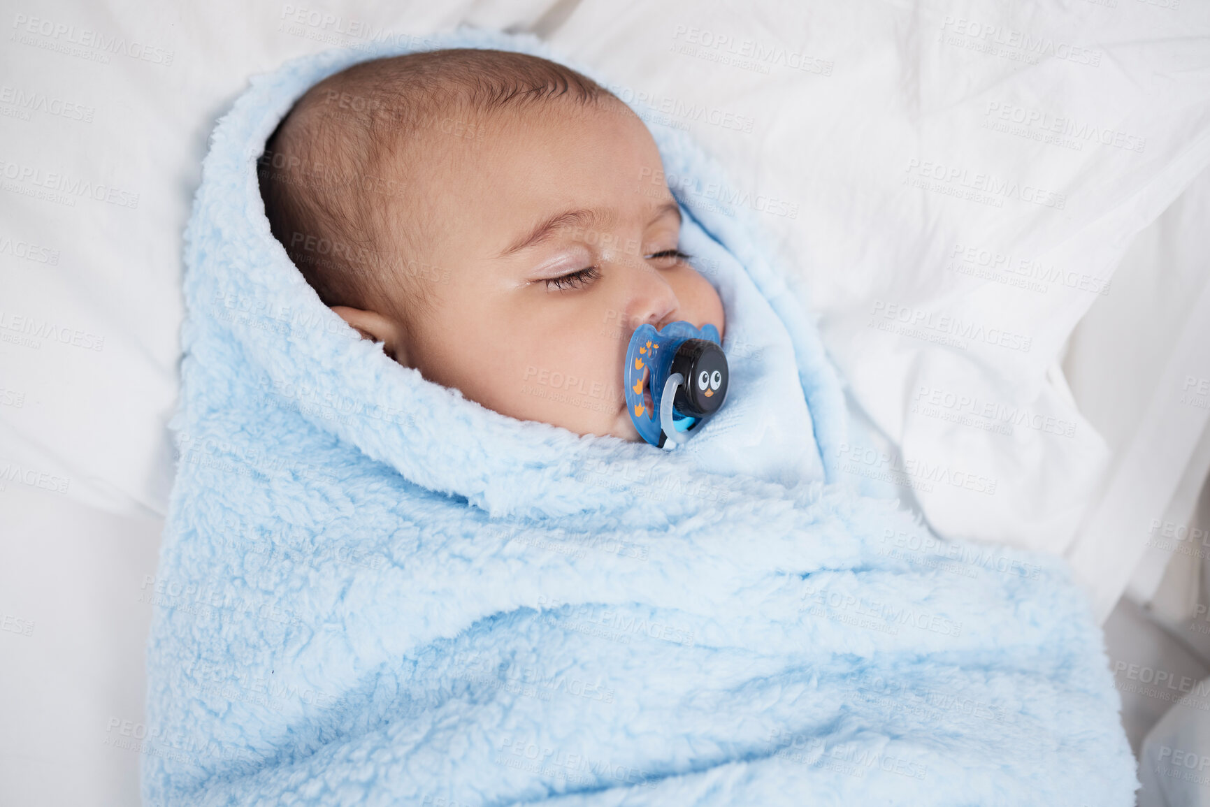 Buy stock photo Baby, bed and sleep in blanket in home, dummy and rest for newborn child in bedroom for growth. Cold, winter and love in nursery for tired infant person, childhood development and face for calm nap