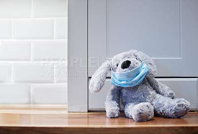 Buy stock photo Shot of a teddy bear on a floor at home