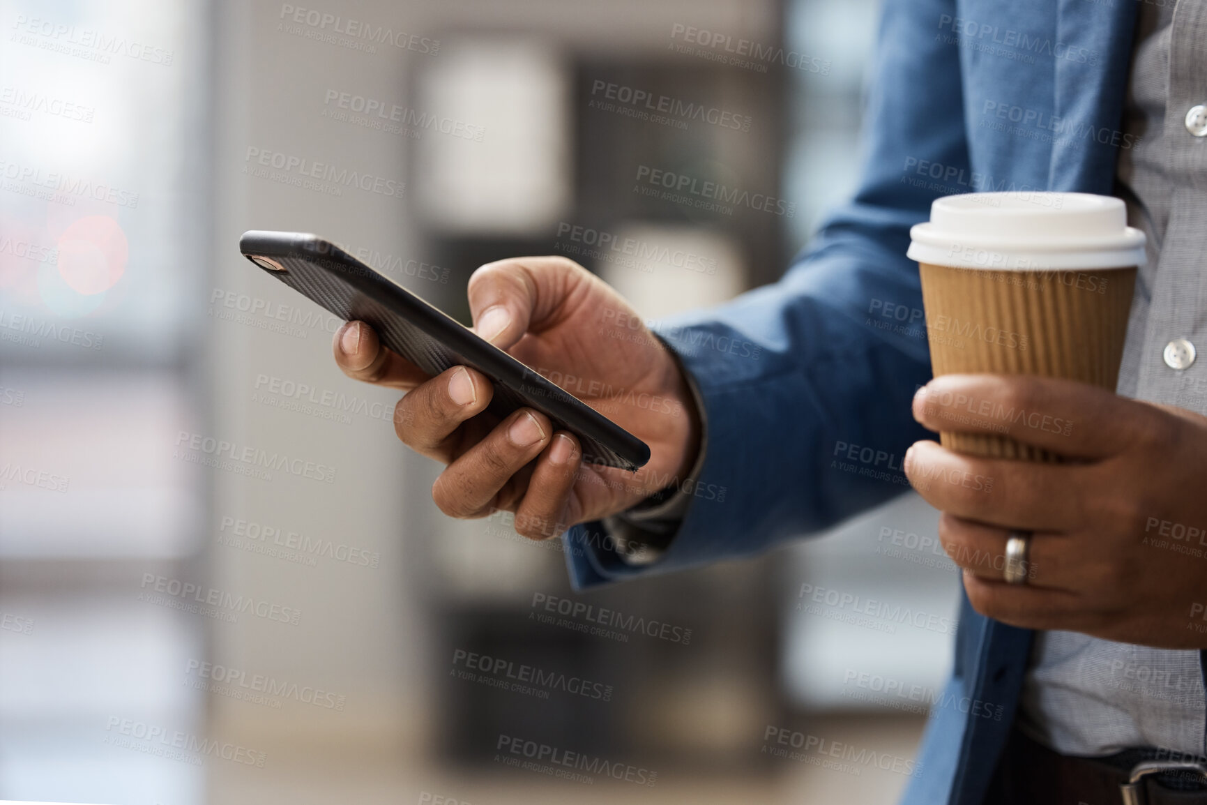 Buy stock photo Closeup shot of an unrecognisable businessman using a cellphone while drinking coffee outside an office