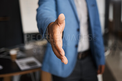 Buy stock photo Closeup shot of an unrecognisable businessman extending a handshake in an office