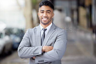 Buy stock photo Portrait, smile and businessman with arms crossed in city outdoor for career, travel and pride in Saudi Arabia. Face, confidence and happy professional in suit, entrepreneur and attorney on street