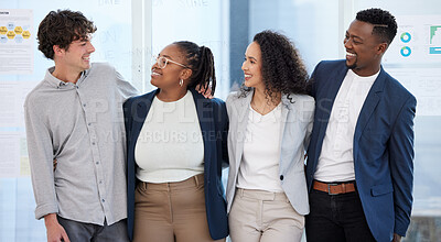 Buy stock photo Shot of a group of businesspeople standing with their arms crossed in an office