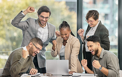 Buy stock photo Shot of a group of businesspeople celebrating a victory together in a modern office