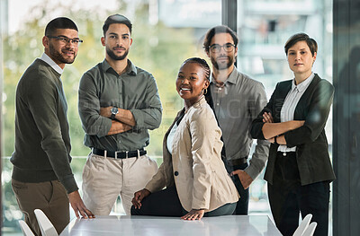 Buy stock photo Portrait of a group of businesspeople having a quick meeting in a modern office