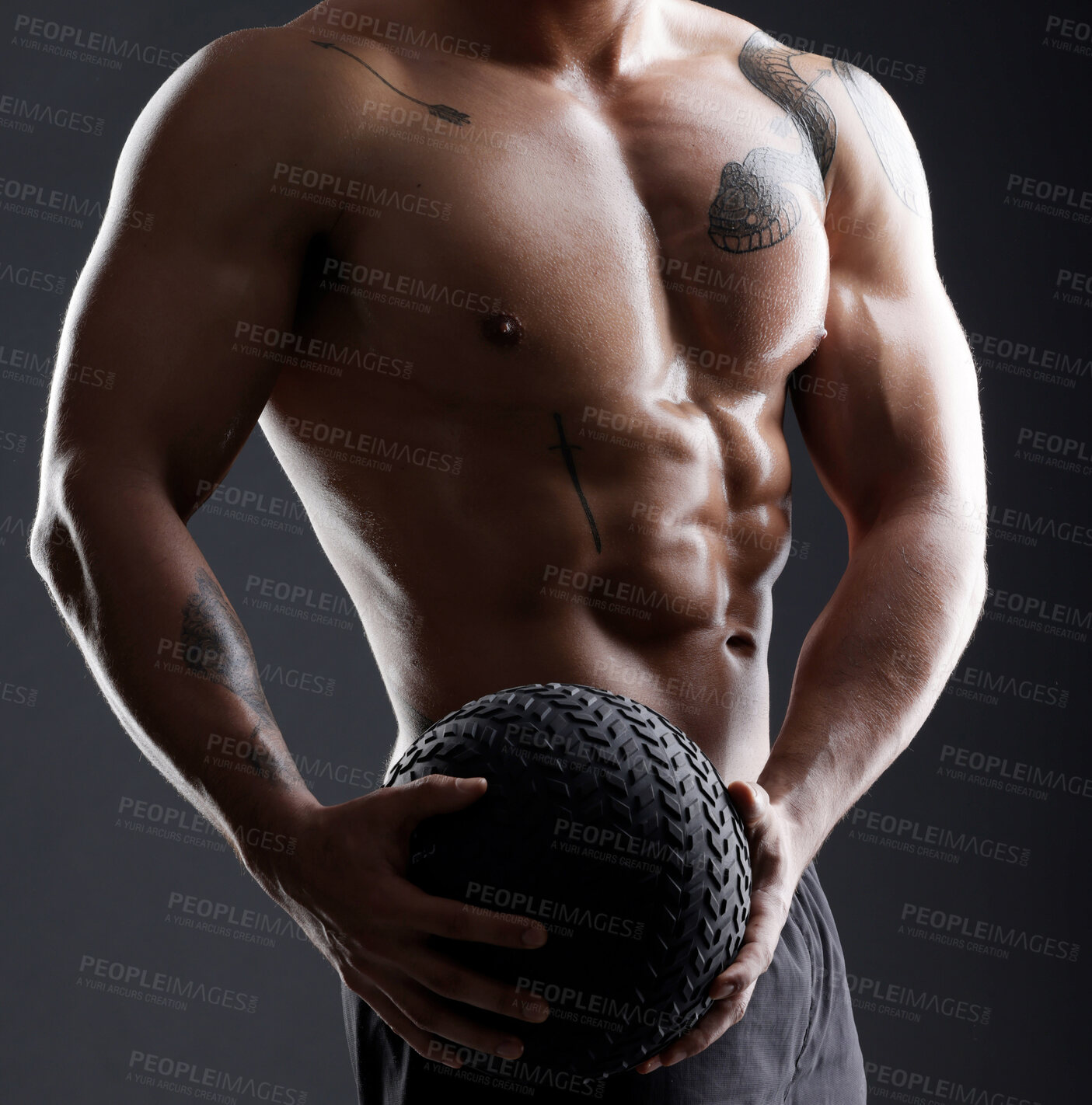 Buy stock photo Ball, hands or strong man in studio for bodybuilding workout, training or exercise for power or strength. Black background, fitness or topless athlete with equipment for sports challenge or wellness