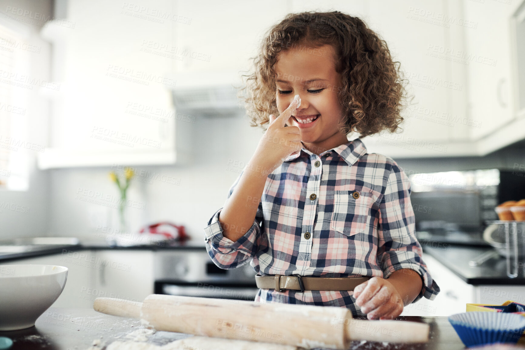 Buy stock photo Playing, girl or happy kid baking with pin or dough in kitchen for child development to prepare cookies in home. Smile, nose or young baker learning pastry recipe for meal, cooking snacks or dessert