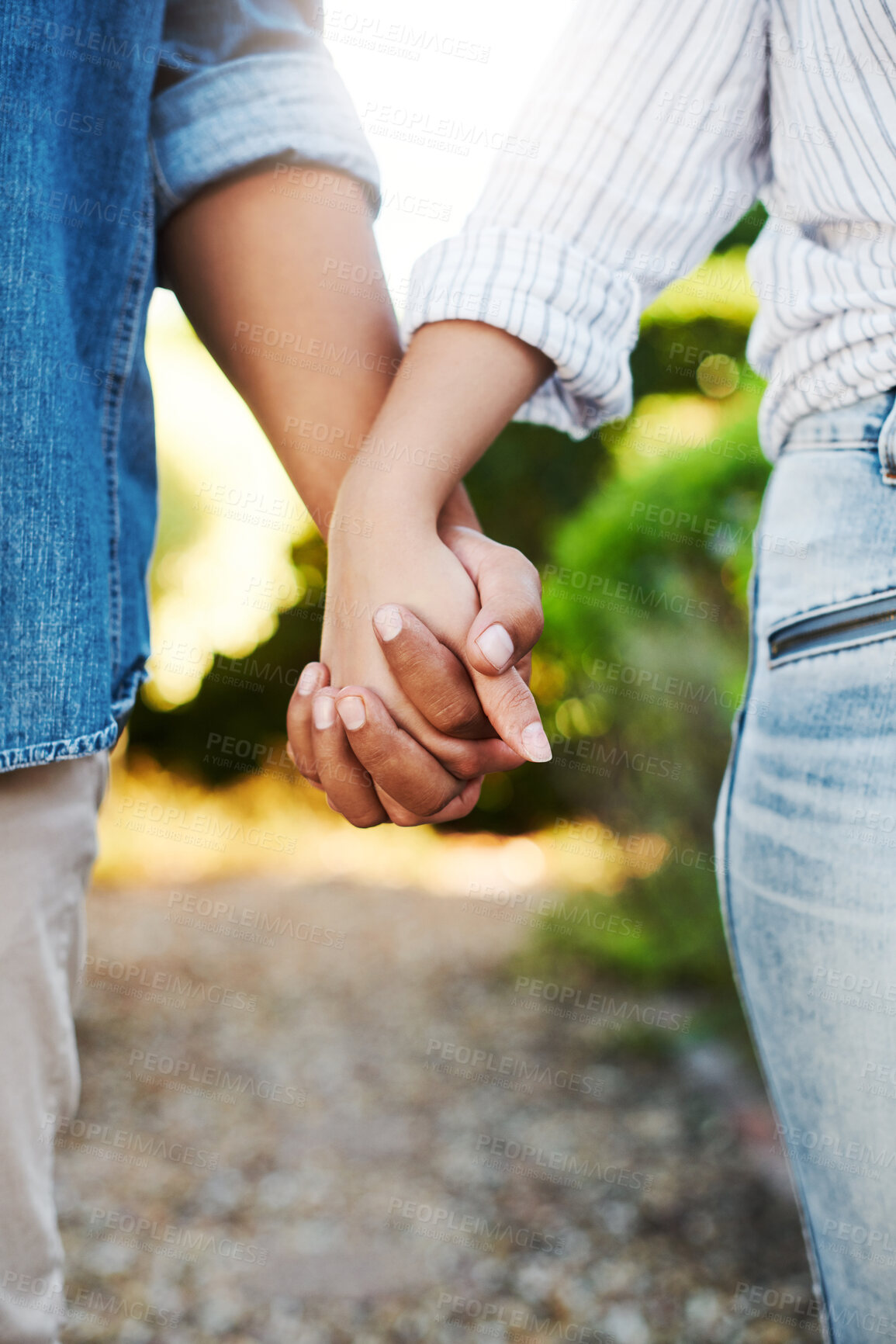 Buy stock photo Couple, holding hands and outdoor with zoom for date with romance, bonding together in backyard for relationship.  People, palms together and walk in backyard with partner for love, trust or support