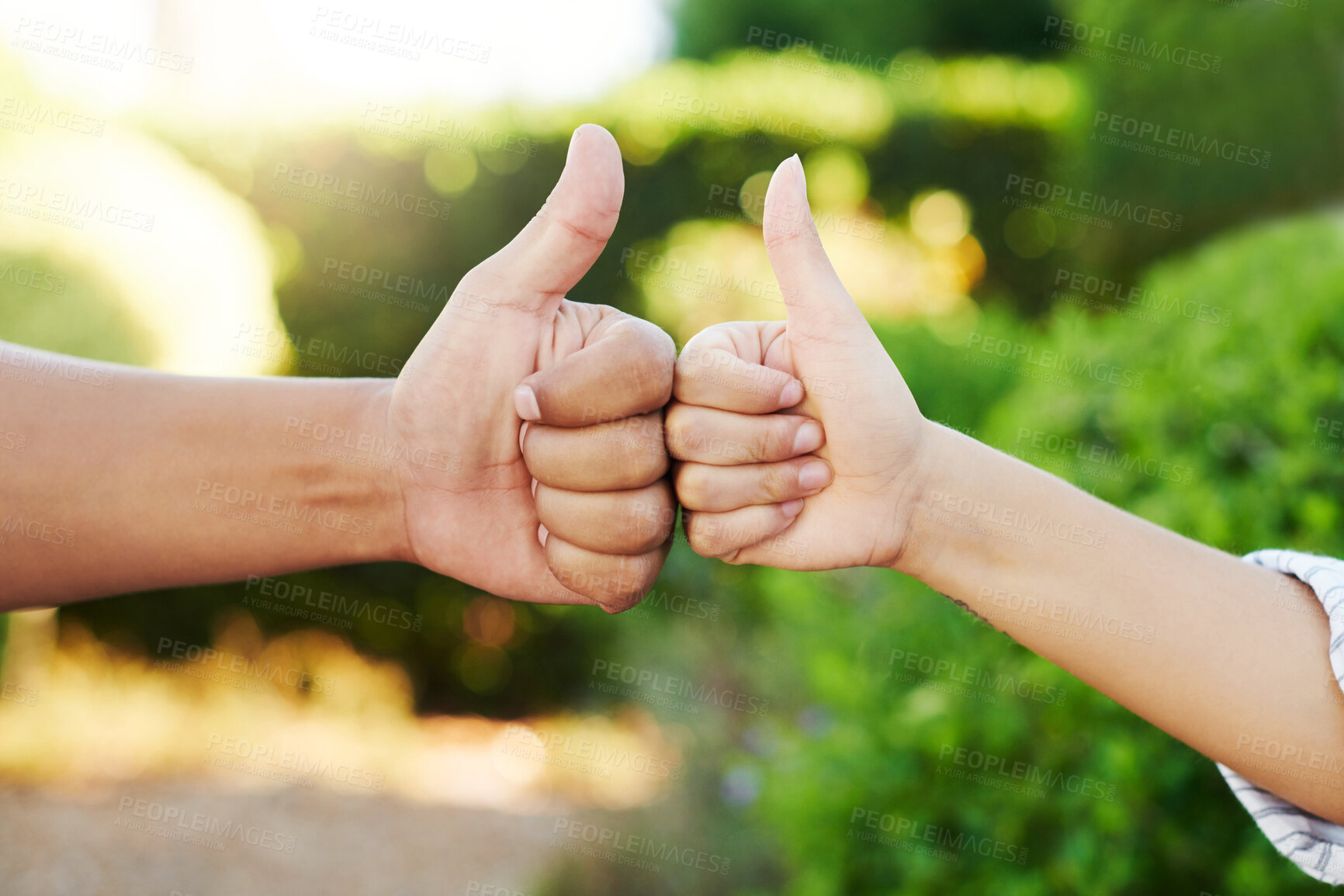 Buy stock photo Outdoor, couple and thumbs up for support, fist bump and motivation with thank you, agreement and teamwork. Closeup, hand sign and people in backyard, like and icon with emoji, collaboration or yes