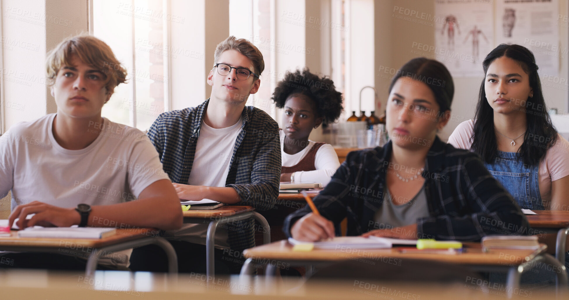 Buy stock photo Education, college and students sitting in a classroom for learning, studying or future development. School, university and scholarship with a group of pupils in class lecture together to learn