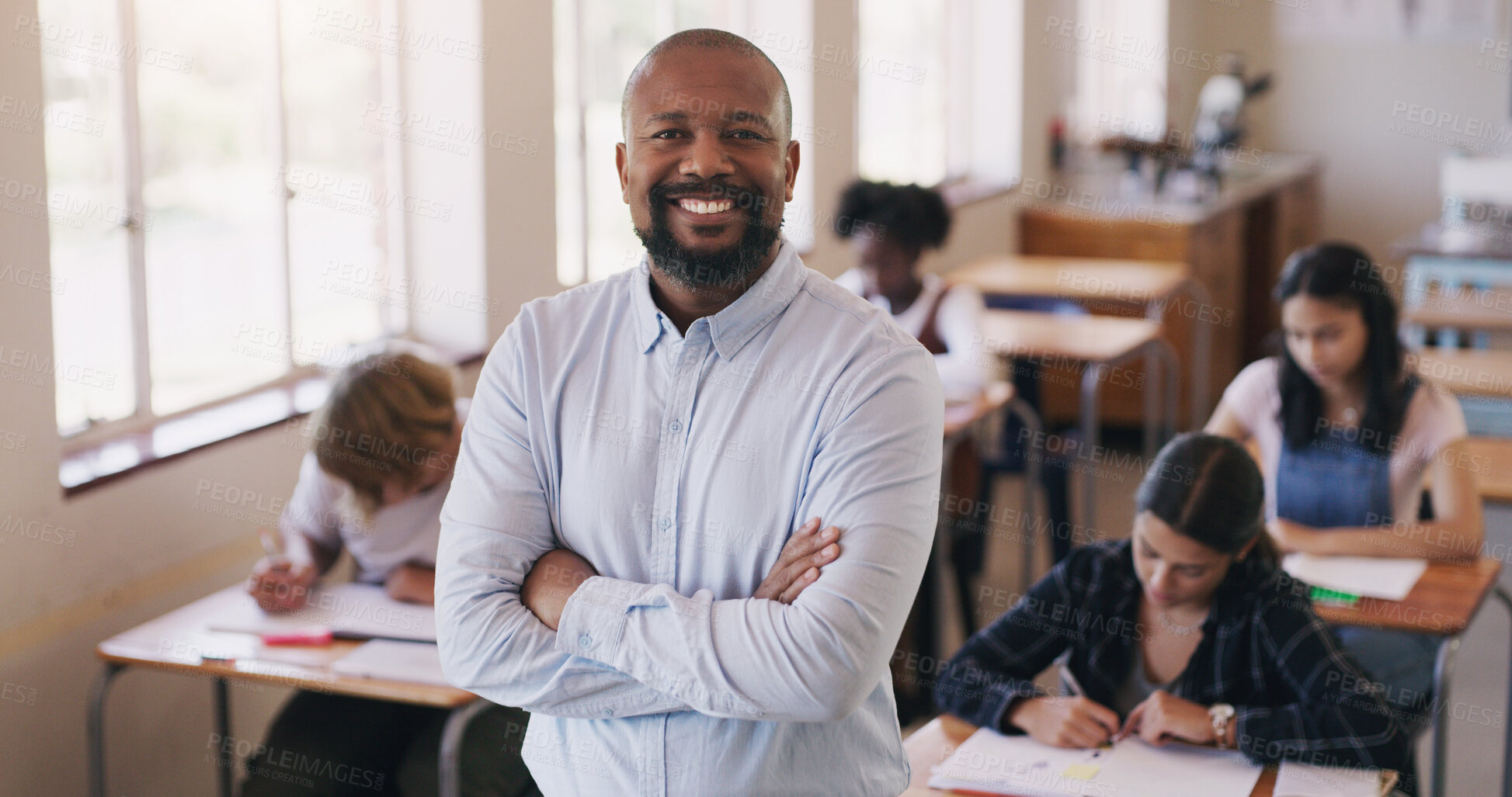 Buy stock photo Portrait of mature man teaching a class of teenage students