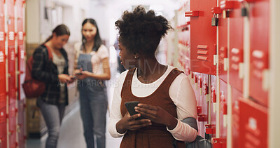 Buy stock photo School bully and a girl with a cellphone for gossip, secret or rude message online. Sad, anxiety and an African student on a mobile app with group whisper from students doing cyber bullying at class