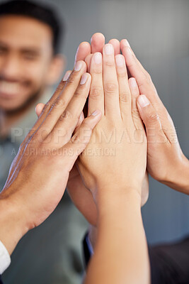 Buy stock photo Closeup shot of a group of unrecognisable businesspeople giving each other a high five in an office
