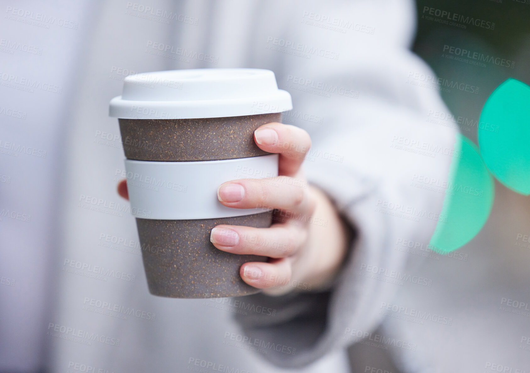 Buy stock photo Shot of an unrecognizable person holding a coffee cup