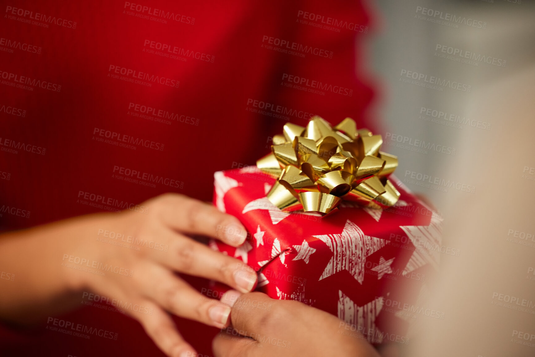Buy stock photo Christmas present, people and hands at party for celebration of festive season with tradition. December holiday, xmas gift and ribbon with wrapping paper in closeup for giving box at vacation event