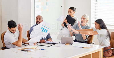 Buy stock photo Shot of a young businessman getting upset during a meeting