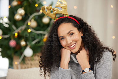 Buy stock photo Christmas, woman and happy portrait in home, tree and Christian winter holiday or birth of Jesus Christ. Festive, gift giving and decorations with headband or celebrate fun, comfortable in apartment