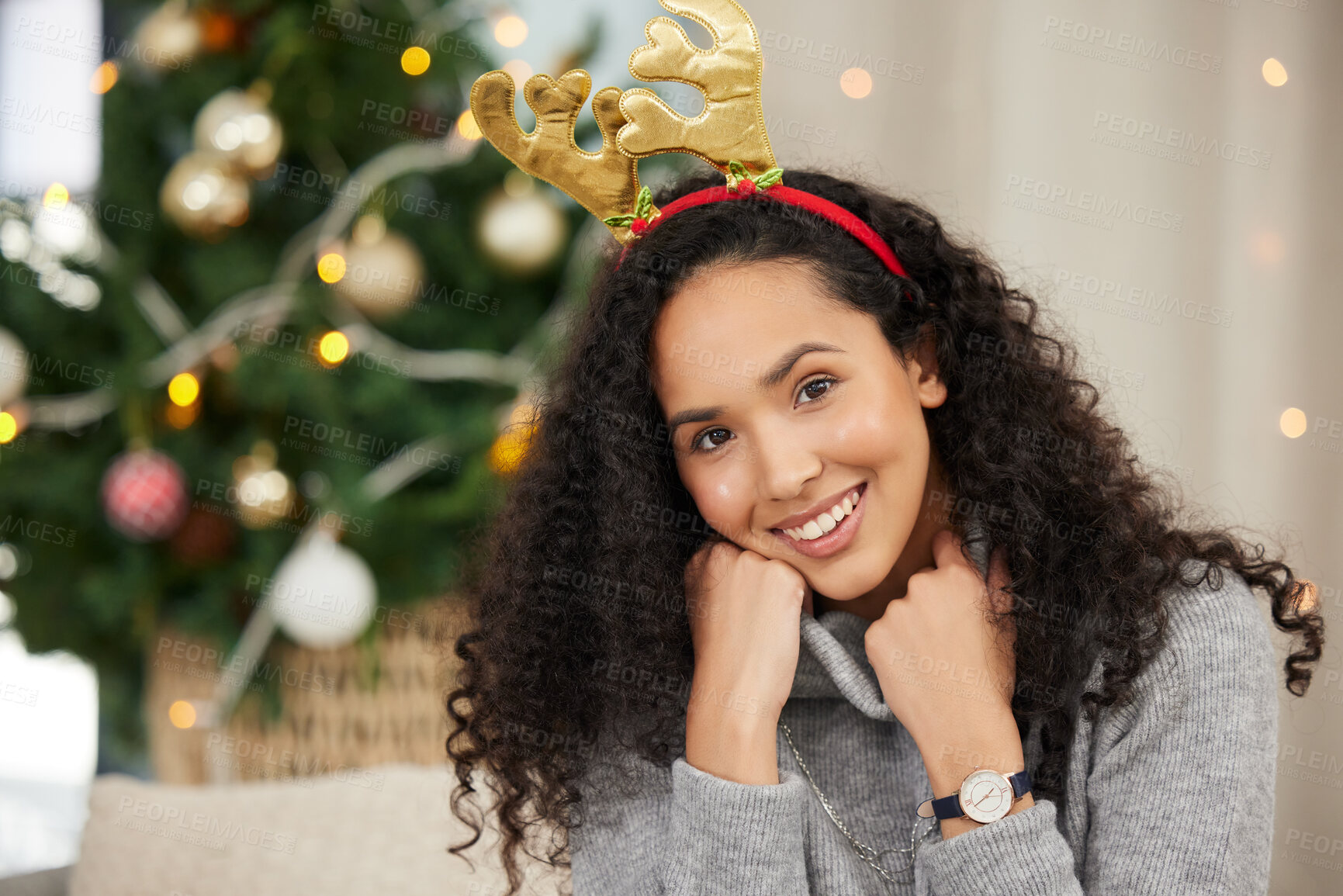 Buy stock photo Christmas, woman and happy portrait in home, tree and Christian winter holiday or birth of Jesus Christ. Festive, gift giving and decorations with headband or celebrate fun, comfortable in apartment