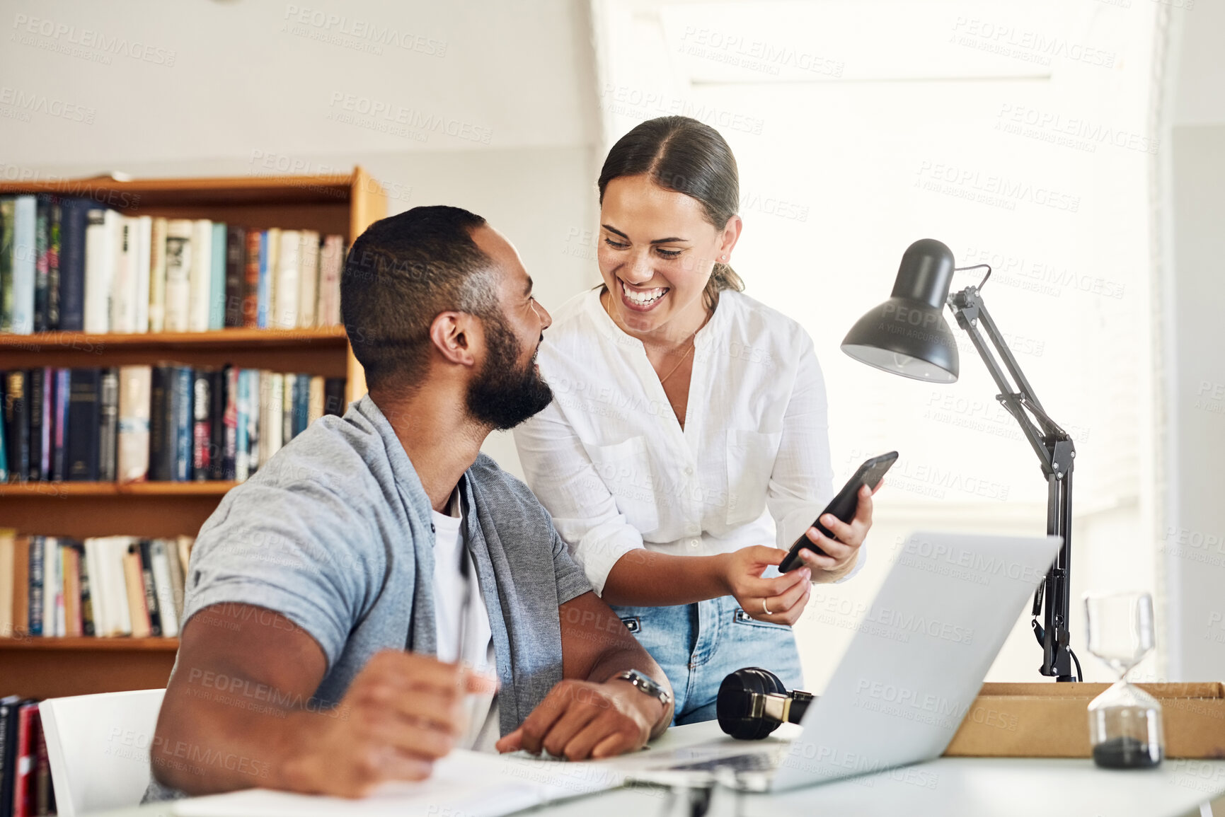 Buy stock photo Shot of a young couple spending time together