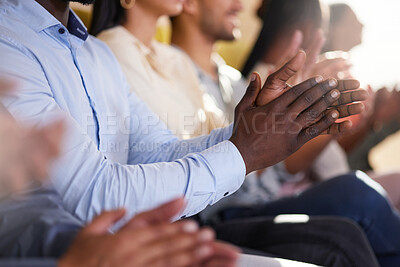 Buy stock photo Cropped shot of an unrecognizable diverse group of businesspeople applauding while sitting in the boardroom during a presentation
