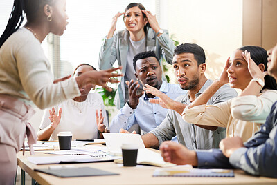 Buy stock photo Cropped shot of a diverse group of businesspeople arguing during a meeting in the boardroom