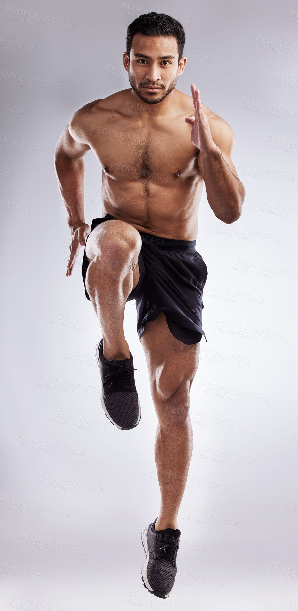 Buy stock photo Man, running and body in studio for workout, speed and fitness on white background with exercise. Athlete, race and training for sports, competition and performance as runner with health or portrait