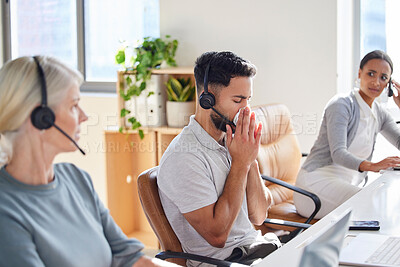 Buy stock photo Man, sick and coworkers in call centre office or blowing nose with unhappy colleagues, telemarketing or flu. Male person, headset and customer service or with cold symptoms, contagious or illness