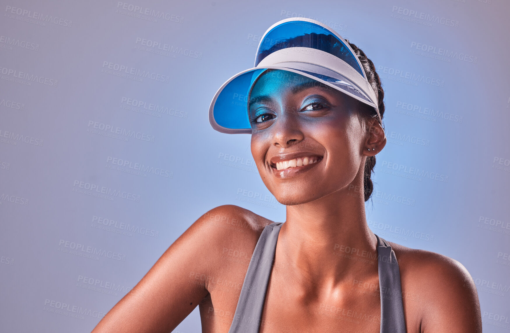 Buy stock photo Studio shot of a fit young woman posing against a grey background