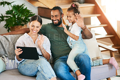 Buy stock photo Shot of a happy family making a video call on a digital tablet at home