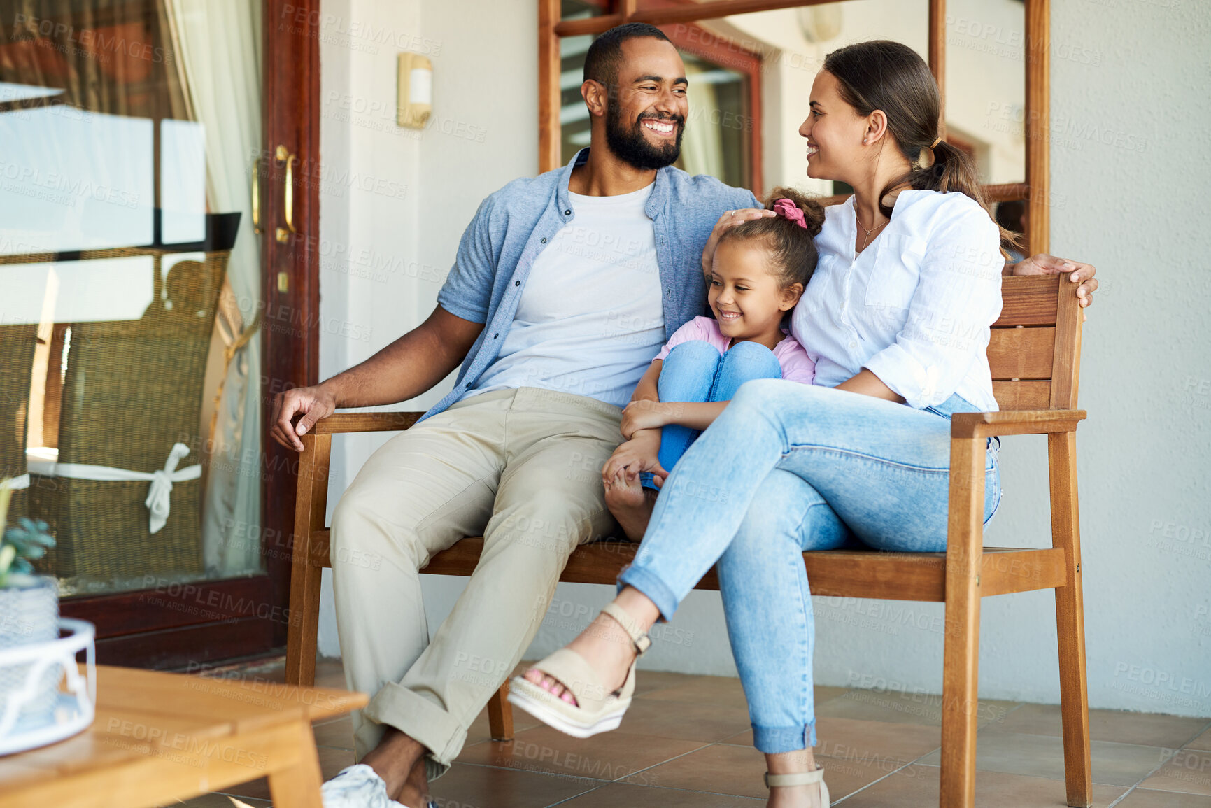 Buy stock photo Shot of a happy family relaxing together at home