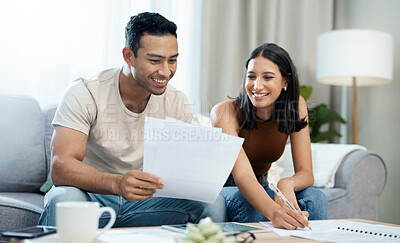 Buy stock photo Happy couple, documents and budget planning in finance, expenses or bills together on sofa at home. Man and woman smile with paperwork in living room for loan, financial plan or insurance at house