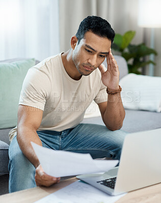 Buy stock photo Man, bills and headache on computer and sofa for finance mistake, debt review or taxes stress at home. Young and confused person with documents for budget fail, bankruptcy or inflation news on laptop