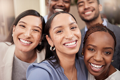 Buy stock photo Shot of a team of businesspeople taking a selfie together