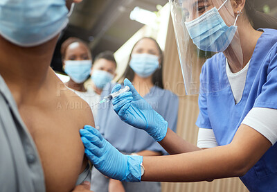 Buy stock photo Cropped shot of an unrecognizable businessman getting his covid vaccination from a female nurse in the office