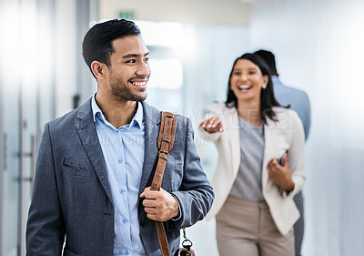 Buy stock photo Shot of businesspeople walking through an office