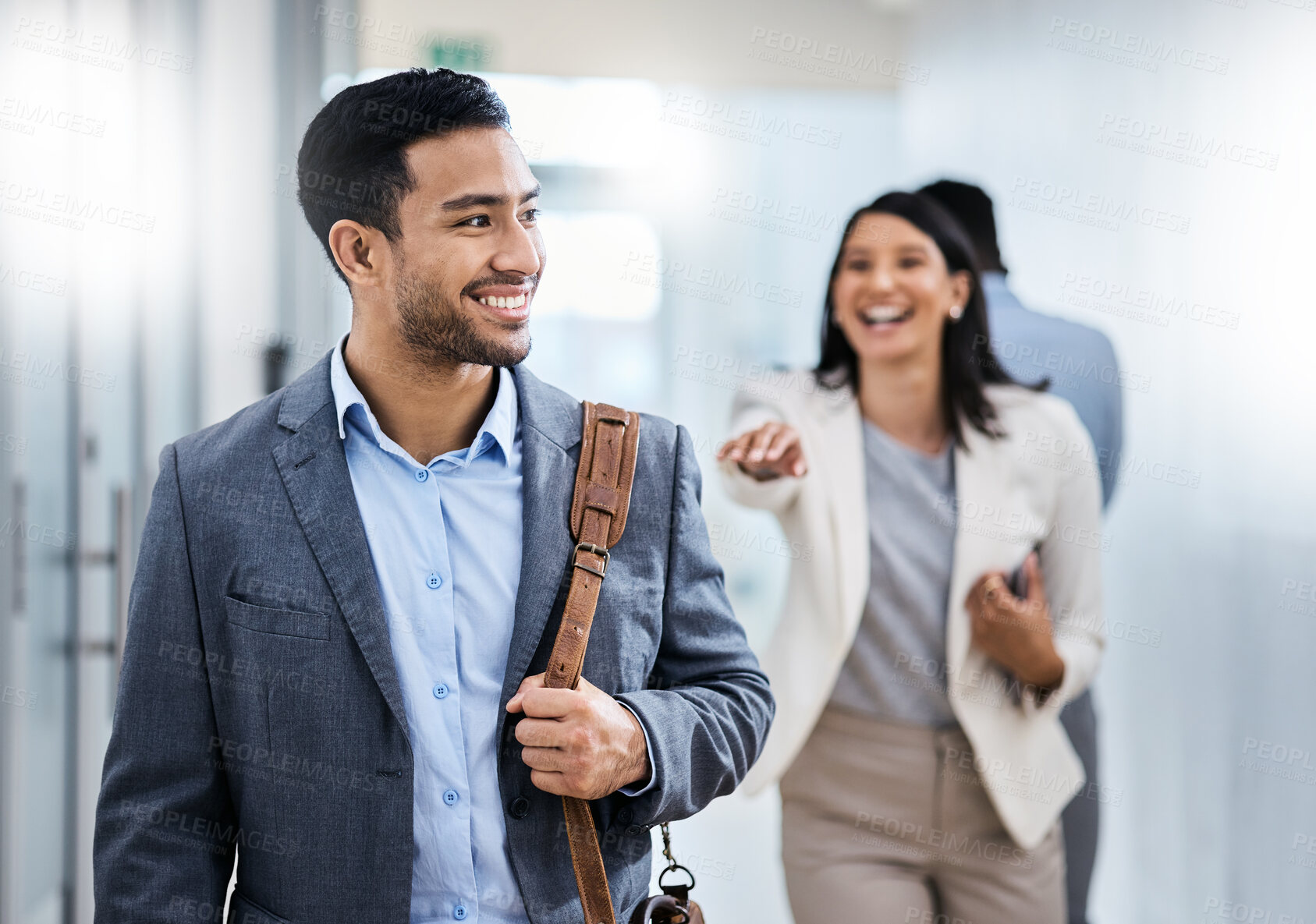 Buy stock photo Shot of businesspeople walking through an office