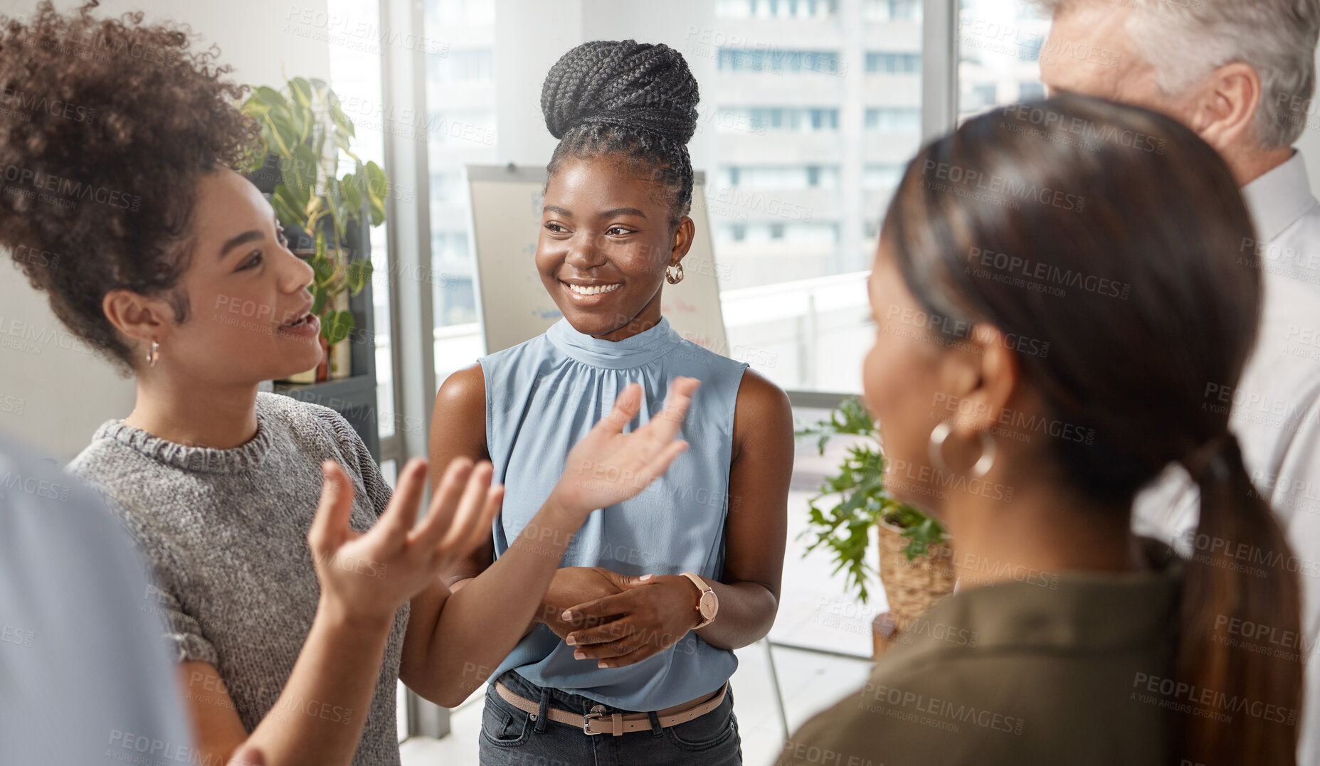 Buy stock photo Shot of a group of businesspeople in a meeting at work