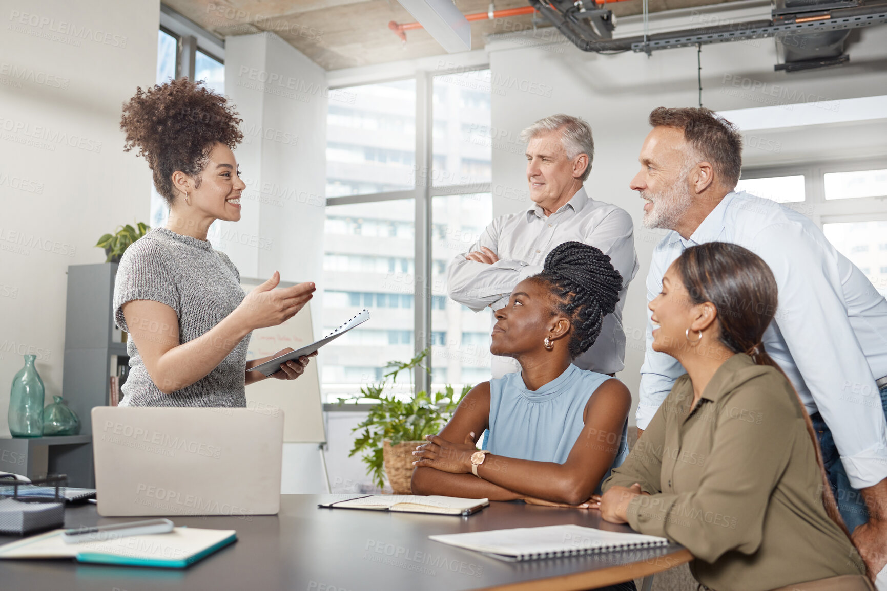 Buy stock photo Shot of a group of businesspeople in a meeting at work