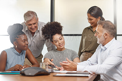 Buy stock photo Shot of a group of businesspeople in a meeting at work