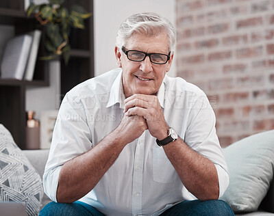 Buy stock photo Portrait of an older man relaxing on the sofa at home