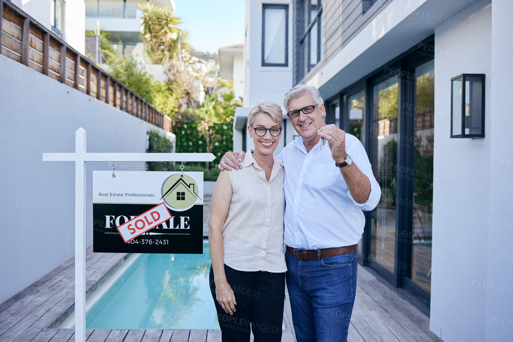 Buy stock photo Mature couple, portrait and new home with smile for pride, happiness and real estate in Florida. Senior man, woman and together outside house for property investment, keys and for sale sign