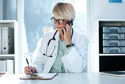 Buy stock photo Shot of a female doctor sitting in her office