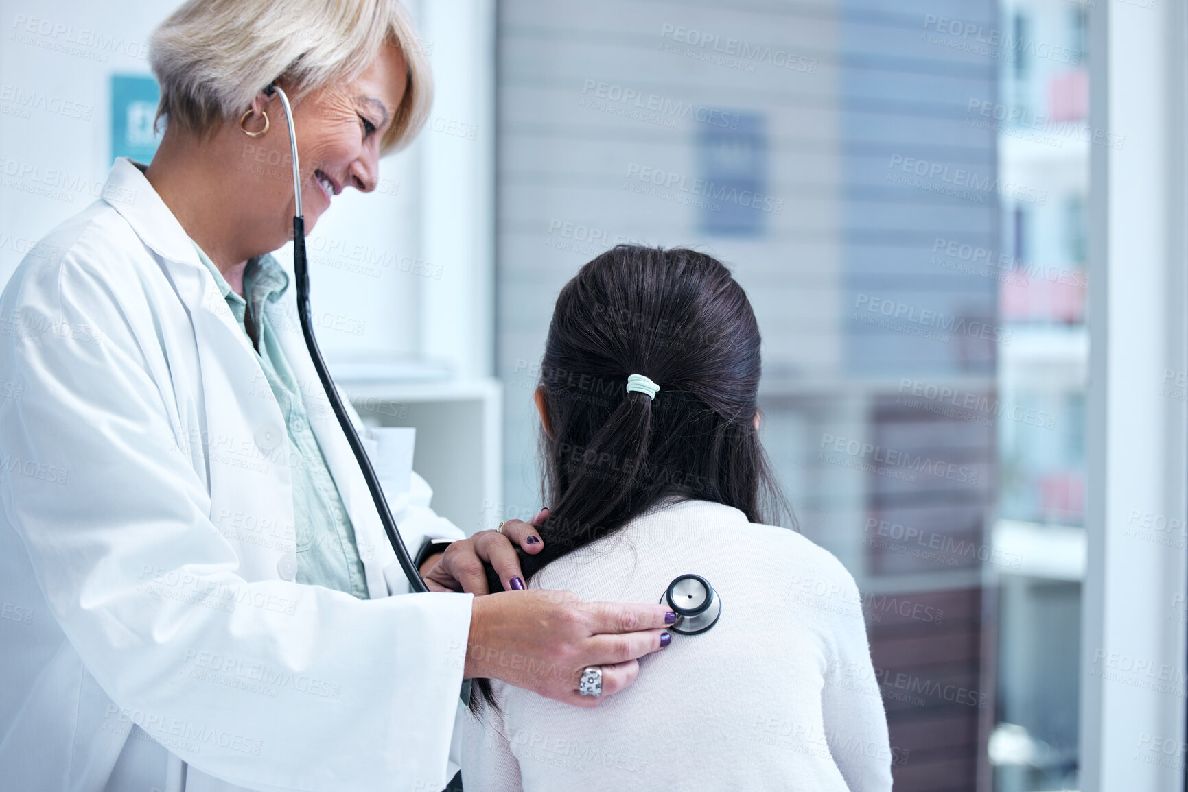Buy stock photo Healthcare, pediatrician or stethoscope with woman and child at hospital for appointment or checkup. Cardiology, doctor or medical with happy mature medicine professional at back of patient in clinic