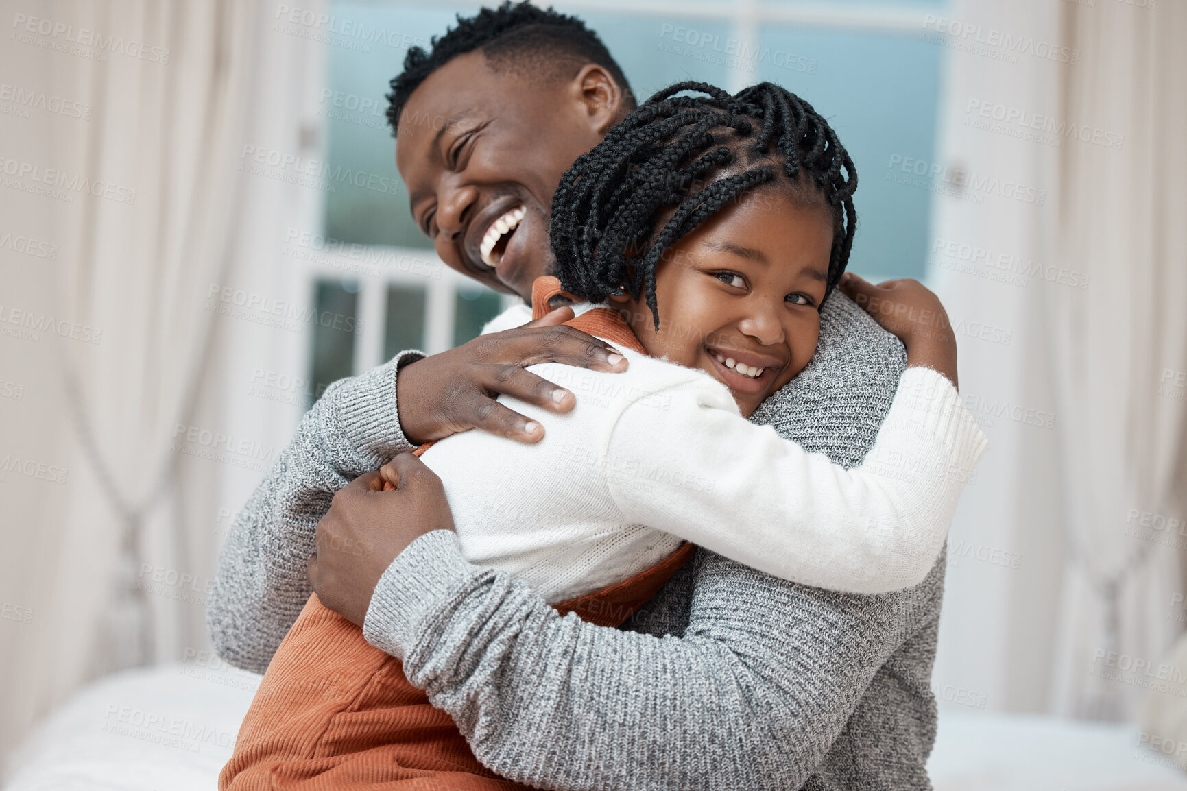 Buy stock photo Dad, girl and smile with hug in bedroom for bonding, love and trust with support for child development. Black people, parent and kids in home with smile or laugh for comfort and safety for bedtime