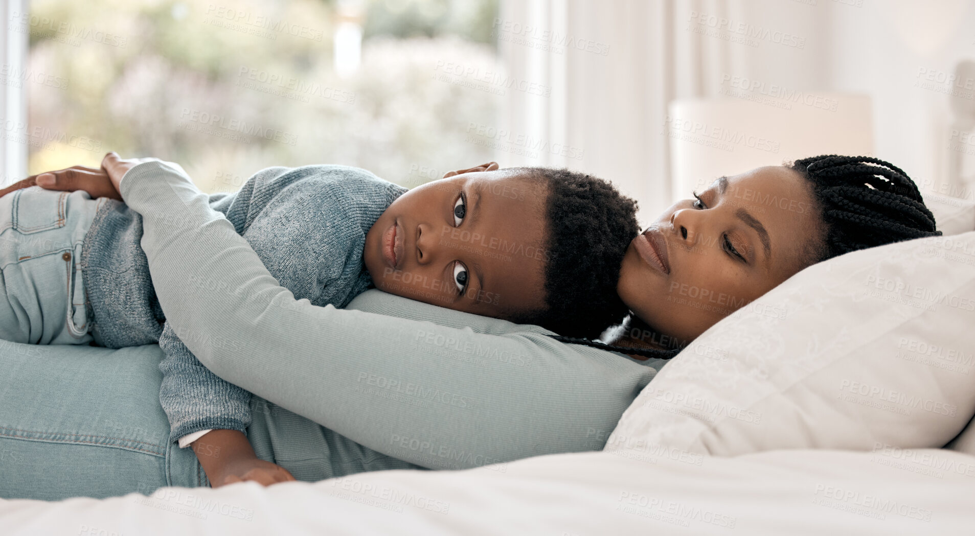 Buy stock photo Portrait, boy and mother in bed with hug, support and childhood development for love and affection. Black woman, son and bonding in home, together for care as family on weekend for memory or emotion