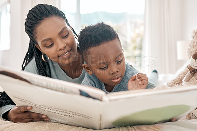 Buy stock photo Black family, mother and child reading book for learning, storytelling and bonding. African mom, kid and story time, education and development, studying or homeschool, knowledge and care in bedroom.