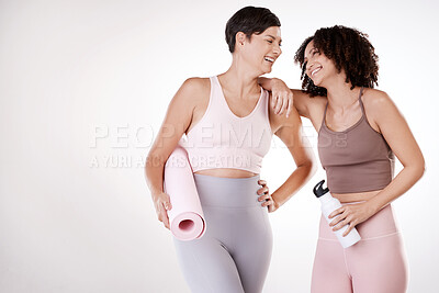 Buy stock photo Cropped shot of two attractive young female athletes posing in studio against a grey background